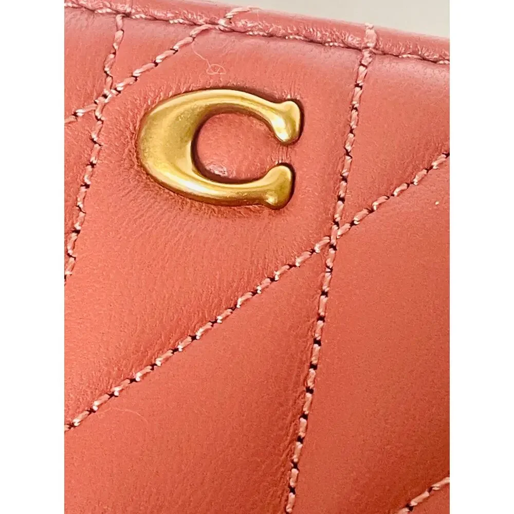 Coach crafted quilted